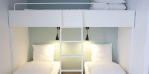 Postel nebo postele na pokoji v ubytování Motel X