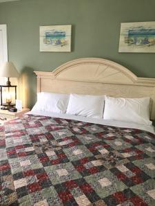 מיטה או מיטות בחדר ב-Ocean Lodge Hotel & Apartments