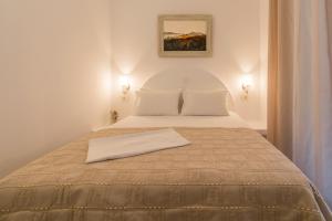 Posteľ alebo postele v izbe v ubytovaní Giannoulis Hotel