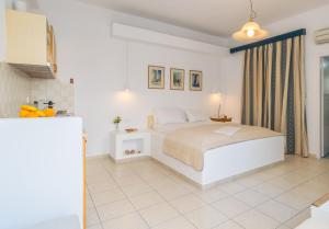Posteľ alebo postele v izbe v ubytovaní Giannoulis Hotel