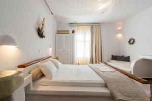 Posteľ alebo postele v izbe v ubytovaní Giannoulis Hotel