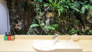
A bathroom at Ngellil Nature Island Resort
