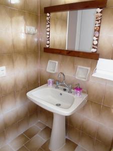 Kylpyhuone majoituspaikassa Sirios Apartments