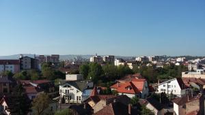 a view of a city with houses and buildings at Sunshine View in Cluj-Napoca