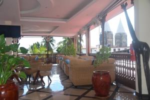TV a/nebo společenská místnost v ubytování Spice Palace Hotel