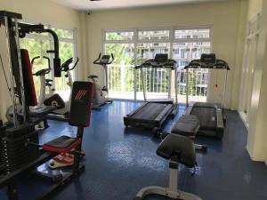 a gym with several treadmills and elliptical machines at Camella Northpoint Condo Studio in Davao City