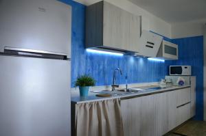 Η κουζίνα ή μικρή κουζίνα στο Sabbia Dorata +25 φωτογραφίες