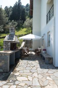 Patio nebo venkovní prostory v ubytování Vourvourou Sea View