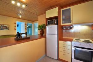 Kuchyň nebo kuchyňský kout v ubytování Mikroulis Residence + 16 fotografií