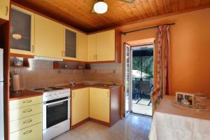 Kuchyň nebo kuchyňský kout v ubytování Mikroulis Residence