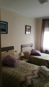 Postel nebo postele na pokoji v ubytování Casa El Serrat del Tell