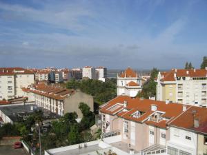 a view of a city with buildings at Casa do Terraço in Aveiro