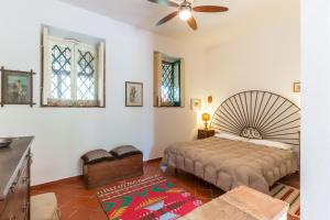 A bed or beds in a room at Etna B&B La casa di Pippinitto