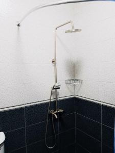 Vonios kambarys apgyvendinimo įstaigoje Apartment Mzeo-s Home