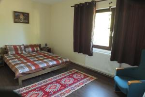 Ένα ή περισσότερα κρεβάτια σε δωμάτιο στο Szejke Villa