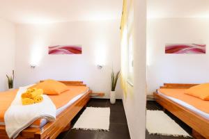 Postel nebo postele na pokoji v ubytování Studio Apartment Maslina