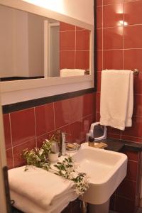 Koupelna v ubytování Hotel Villa Pimpina + 37 fotografií