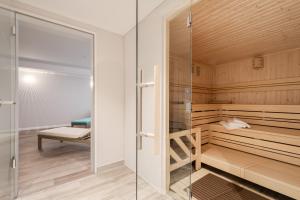 Postel nebo postele na pokoji v ubytování Seegarten Appartements Büsum