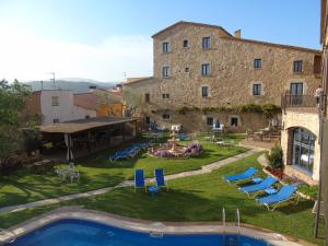 Bazén v ubytovaní Hotel Sant Joan alebo v jeho blízkosti