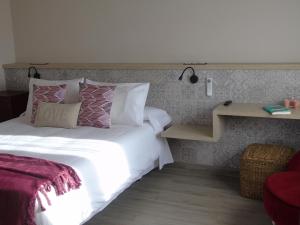 Posteľ alebo postele v izbe v ubytovaní Hotel Sant Joan