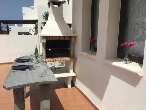 Balkón nebo terasa v ubytování Villa Sunset Faro Deluxe & Spa Pool