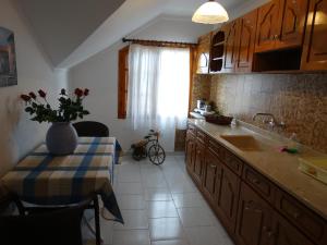 A kitchen or kitchenette at Christakos Apartments