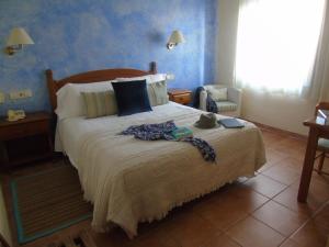 Posteľ alebo postele v izbe v ubytovaní Hotel Sant Joan