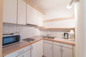 Kuchyň nebo kuchyňský kout v ubytování Pension Apartments Pardell