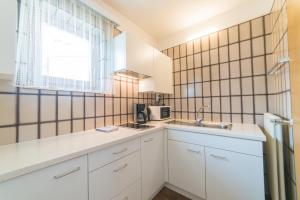 Kuchyň nebo kuchyňský kout v ubytování Pension Apartments Pardell