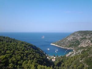 a view of a bay with boats in the water at Elies Houses in Agnontas