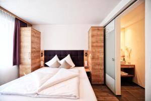 Postel nebo postele na pokoji v ubytování Amaris Apartments