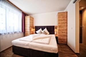 Postel nebo postele na pokoji v ubytování Amaris Apartments