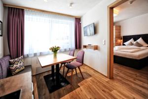 Postel nebo postele na pokoji v ubytování Amaris Apartments