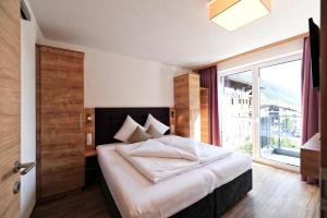 Postel nebo postele na pokoji v ubytování Amaris Apartments