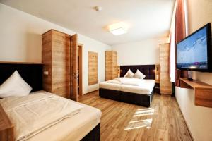 Postel nebo postele na pokoji v ubytování Amaris Apartments