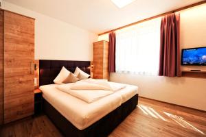 Postel nebo postele na pokoji v ubytování Amaris Apartments