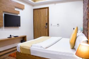 Postel nebo postele na pokoji v ubytování AP Holidays