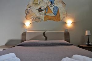 Postelja oz. postelje v sobi nastanitve Kafouros Hotel