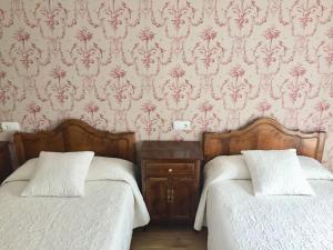 Postel nebo postele na pokoji v ubytování Hotel Rural Nova Ruta