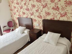 Postel nebo postele na pokoji v ubytování Hotel Rural Nova Ruta