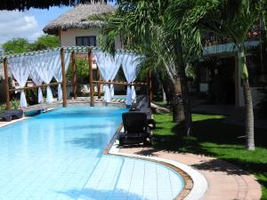 The swimming pool at or close to IL Nuraghe