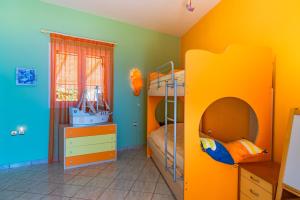 Postel nebo postele na pokoji v ubytování Ioannis House Sea View-Perfect family holidays