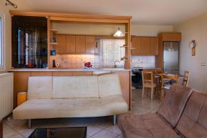 Kuchyň nebo kuchyňský kout v ubytování Ioannis House Sea View-Perfect family holidays