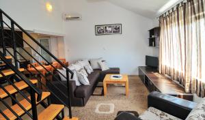 Et opholdsområde på Apartments Pean