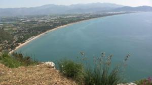 a view of a beach and a body of water at Holiday Home Elena in Terracina