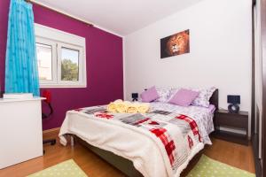 Postel nebo postele na pokoji v ubytování Apartmani Island