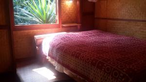 Postel nebo postele na pokoji v ubytování Pencave Homestay
