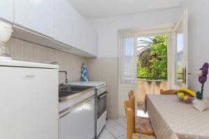 Kuchyň nebo kuchyňský kout v ubytování Apartman u centru Makarske