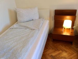 Postel nebo postele na pokoji v ubytování Julius Vendégház