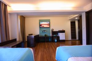 Μια τηλεόραση ή/και κέντρο ψυχαγωγίας στο Awa Resort Hotel